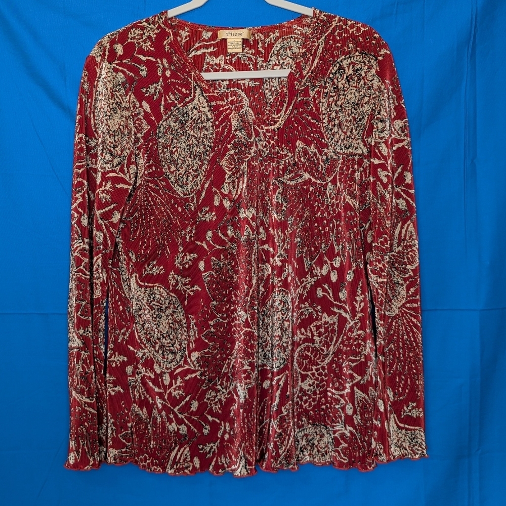 Plisse ribbed long sleeve blouse in rust, black and tan pattern, size large